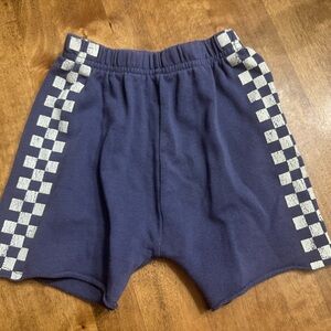 Blue with white checkered shorts